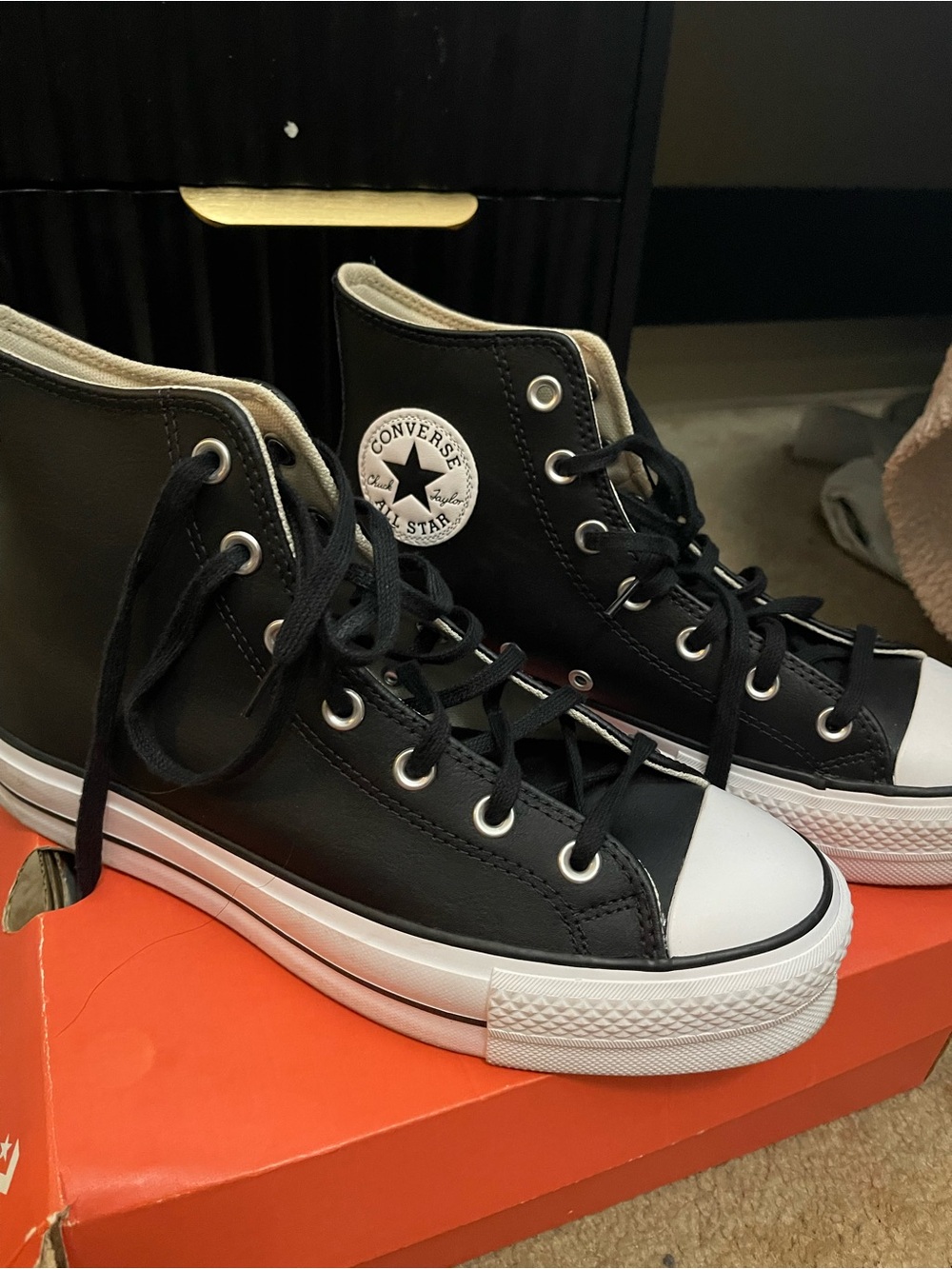 Converse Black and White High Top Leather Sneakers